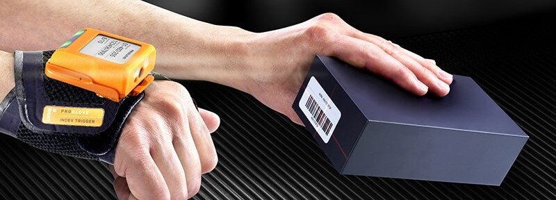 Someone using a ProGlove wearable barcode scanner