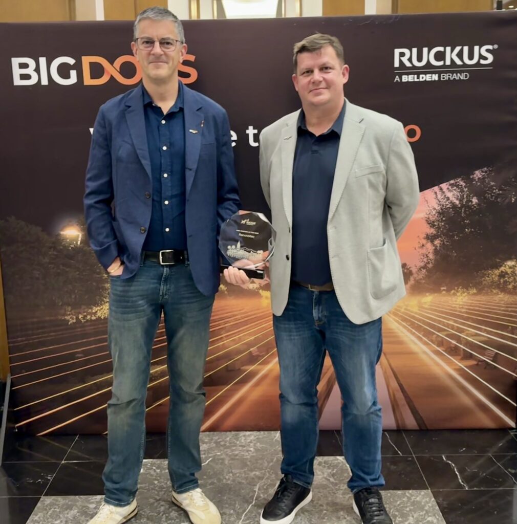 Richard Gilliard, Renovotec CEO and Jamie Motterhead, Technical Director at RUCKUS BIG DOGS EMEA 2026, holding an award.